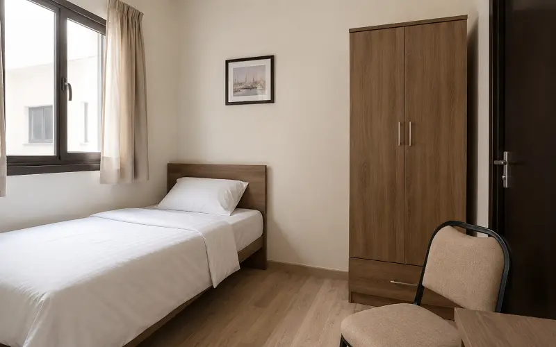 Durable vinyl plank flooring in a UAE villa staff quarters and maid room
