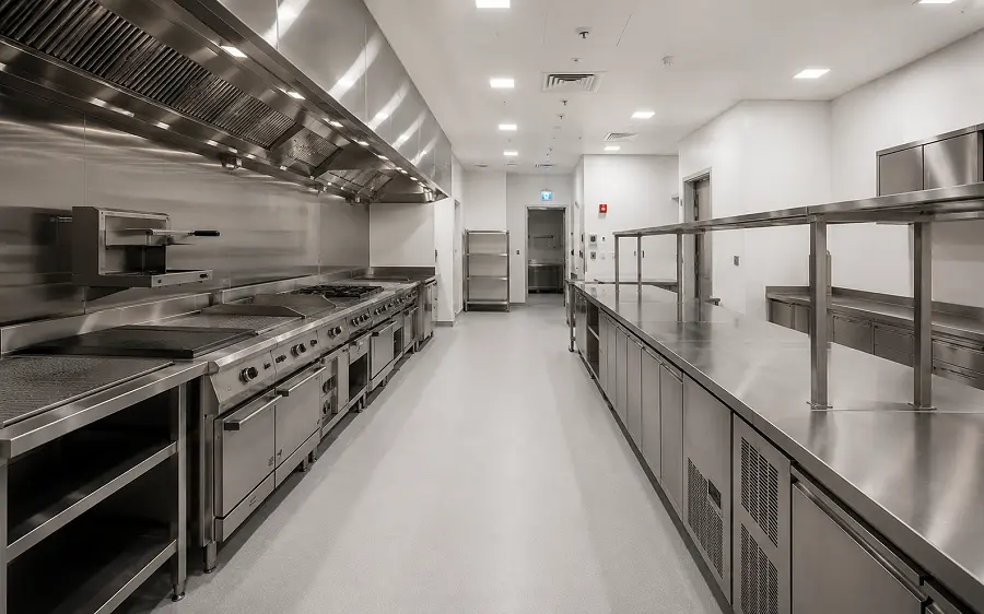 Heat-welded vinyl sheet flooring in a Dubai restaurant BOH kitchen meeting Dubai Municipality Food Control compliance