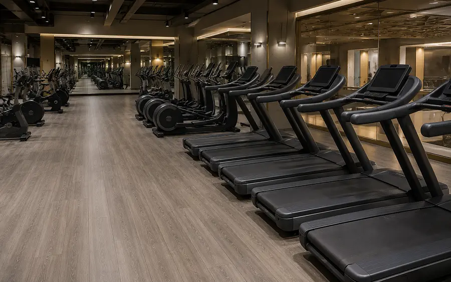 Class 34 SPC vinyl flooring in a Sahara Centre Sharjah commercial gym cardio zone