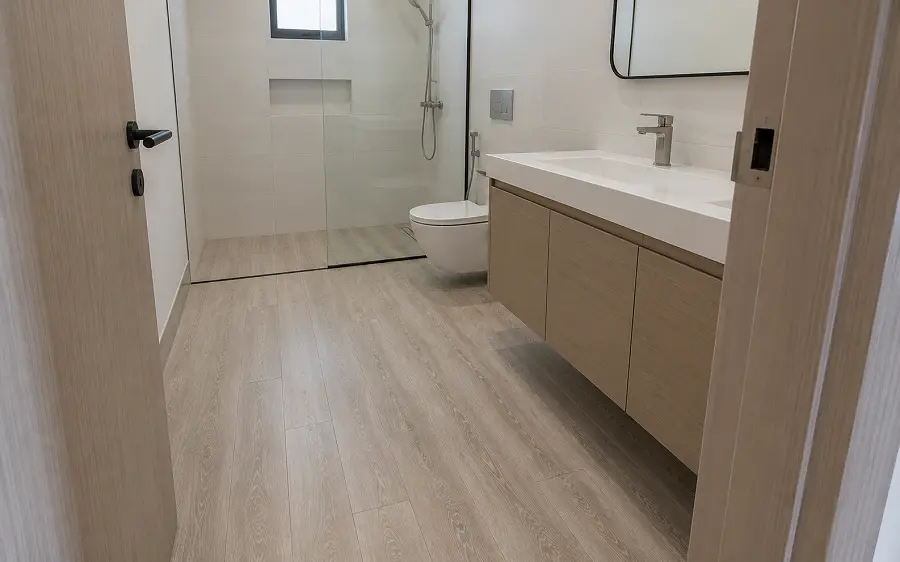 Waterproof SPC vinyl flooring in a UAE residential bathroom with sealed seams